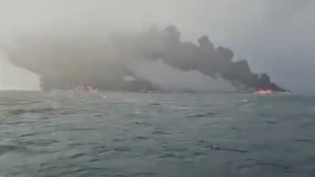 Oil tanker bursts into flames after being struck by container ship off coast of UK