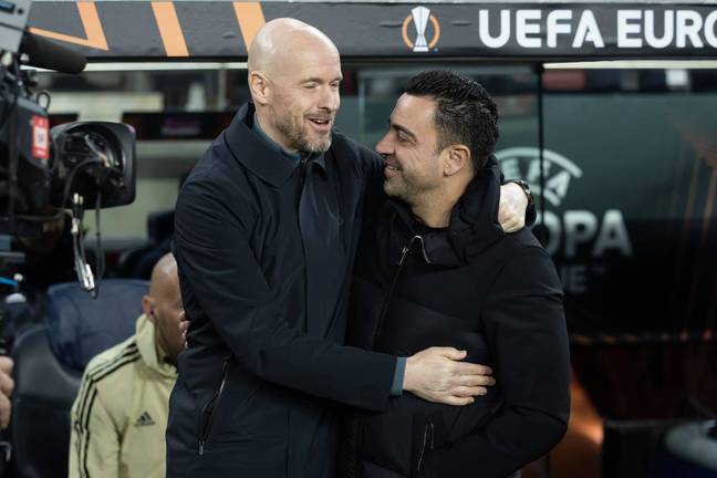 Xavi and Ten Hag embrace after the first game. Image: Alamy