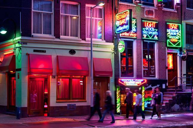 阿姆斯特丹的红灯区每年都会吸引数百万游客。学分：约翰·凯勒曼/阿拉米股票照片