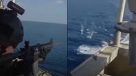 安全警卫在索马里海盗试图攻击船上开枪