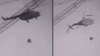 令人痛苦的录像显示，直升机在1986年在切尔诺贝利的核心反应堆上坠毁