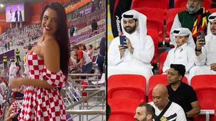 笑的卡塔里球迷在世界杯上为克罗地亚小姐拍照“loading=