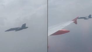 当easyJet飞行被战斗机拦截到Menorca的路上，乘客震惊了