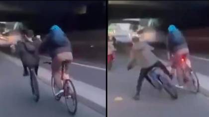 骑自行车的人把轮子骑手推开，并立即获得“业力”