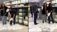 素食主义者猛烈抨击将牛奶倒在超市地板上，以发送消息“loading=