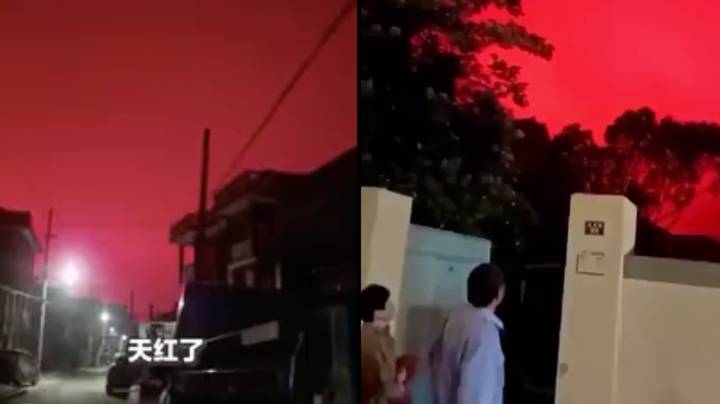 中国的人们震惊，因为天空在怪异的现象中变成红色