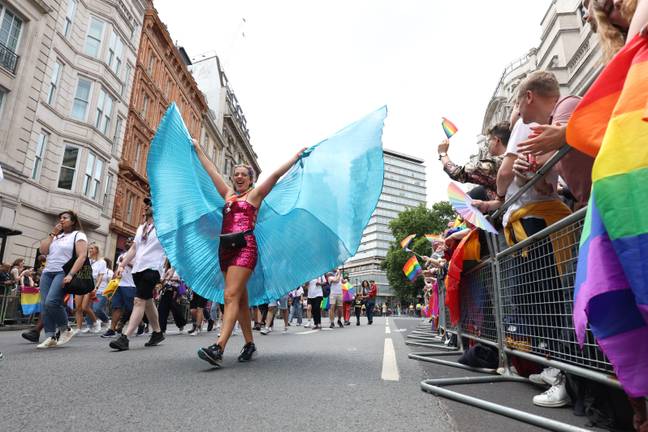 LGBTQ+社区及其盟友的成员今天加入了英国首都游行。信用：Alamy
