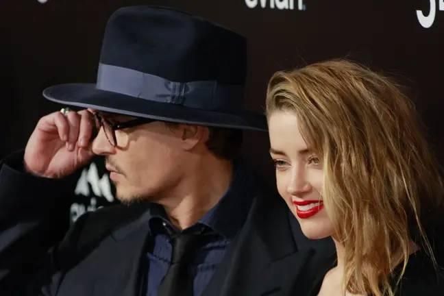 约翰尼·德普（Johnny Depp）和琥珀（Amber）在离婚前听到了。信用：Alamy
