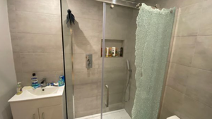 Woman Shocked As Shower Screen 'Explodes' Unexpectedly