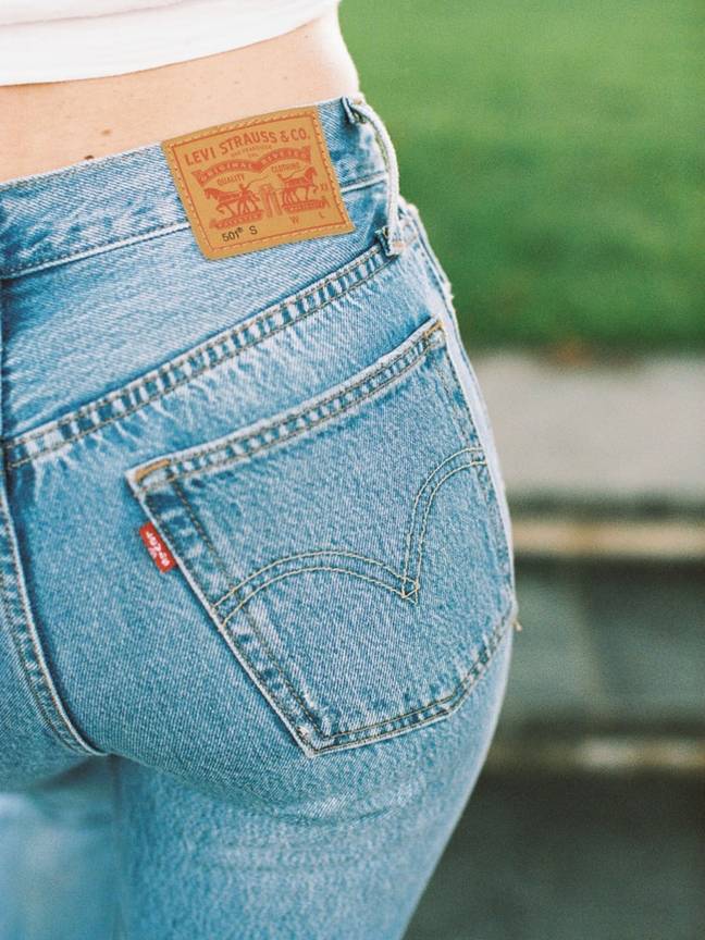 Levi jeans continue to have some of the features from their 1890's 'waist overalls'. (Credit: Unsplash/Ryan Moreno)
