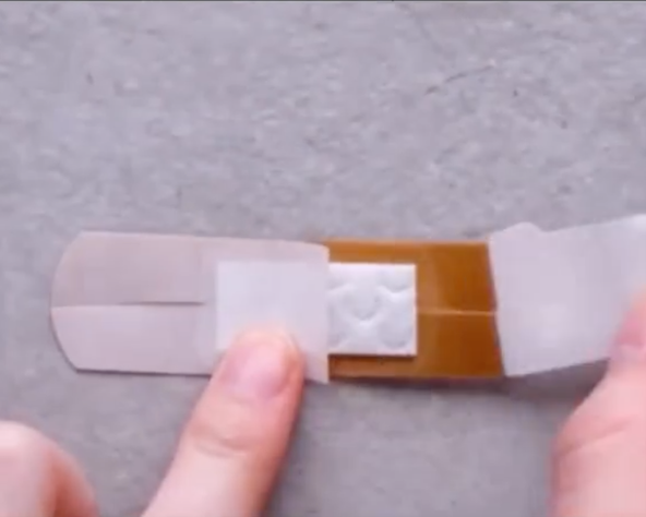 Cutting the plasters at the end helps keep the band-aid in position (Credit: TikTok - lifehacksa)