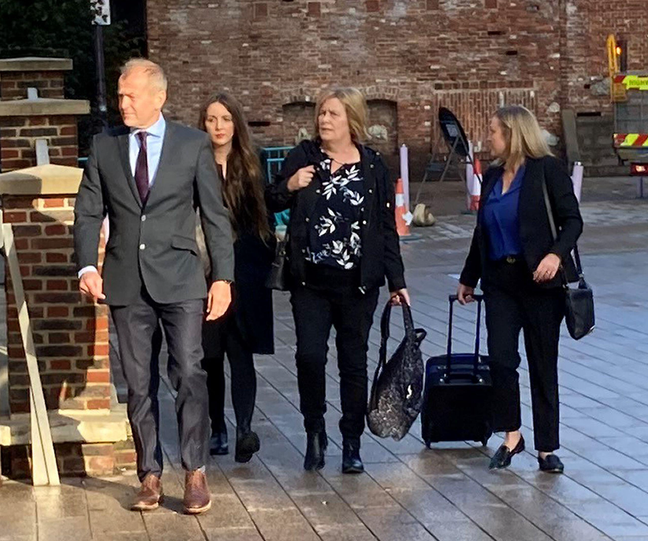 The real Sarah Sak, second right, arriving at Barking Town Hall for the inquest into the murders (Credit: Alamy)
