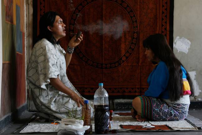 A shaman smoking DMT, credit: Alamy