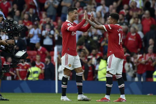 Ronaldo celebrates with Jesse Lingard at full time. Image: PA Images