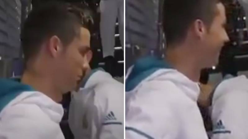Lionel messi and cristiano ronaldo in a playful moment