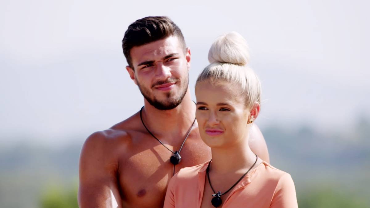Love Island's Molly-Mae Hague and Tommy Fury kiss as they arrive