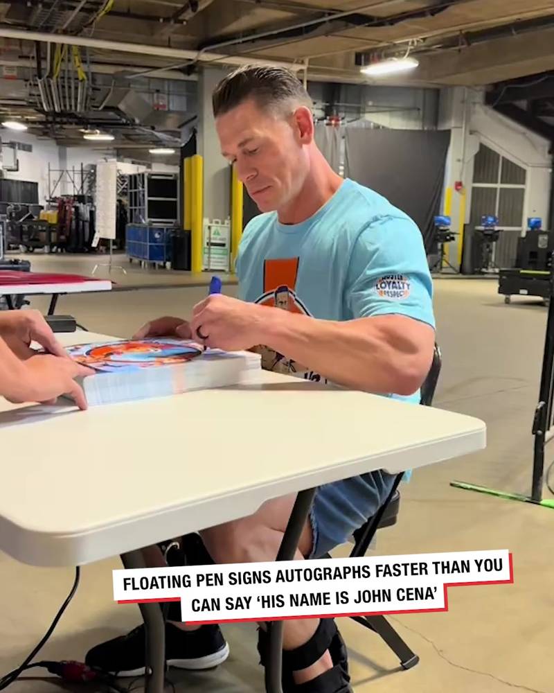 John Cena is an autographing machine