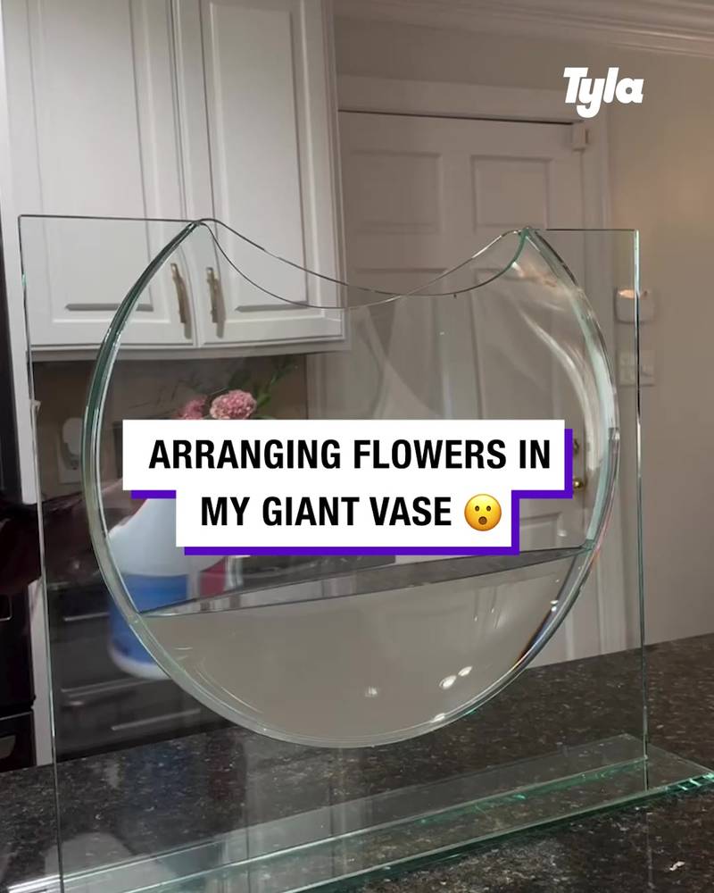Arranging flowers in my giant vase