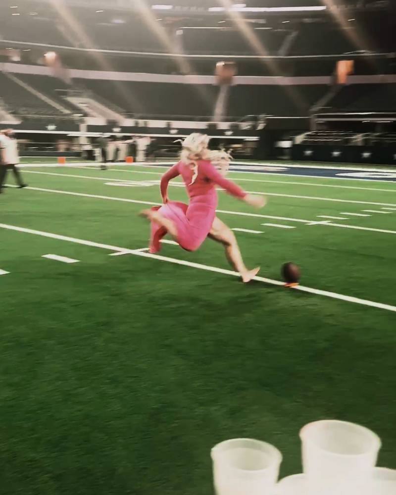 Woman Kicks 30-Yard Field Goal In Pink Dress