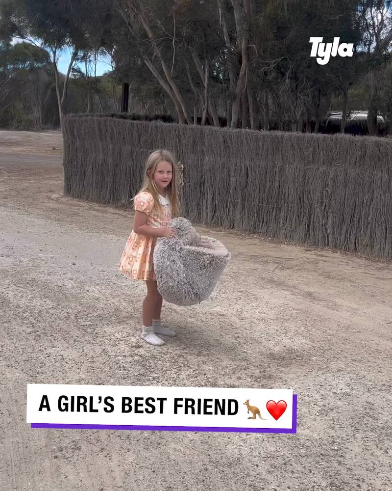A girl is best friends with a kangaroo