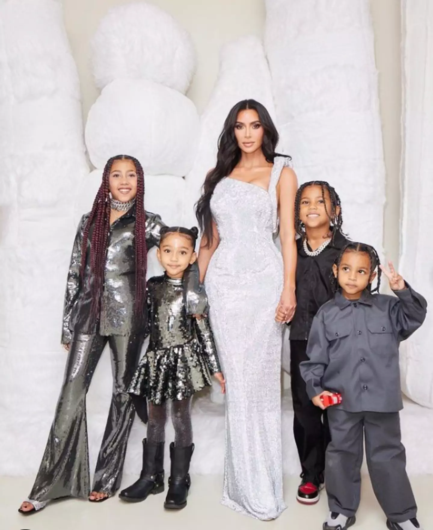 Kim shares kids North, Saint, Chicago, and Psalm with ex Kanye West.