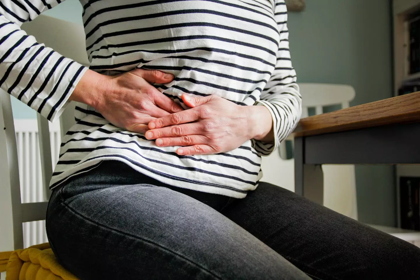 Women have been advised that pain in the lower abdomen may be a symptom. (Getty Stock Image)