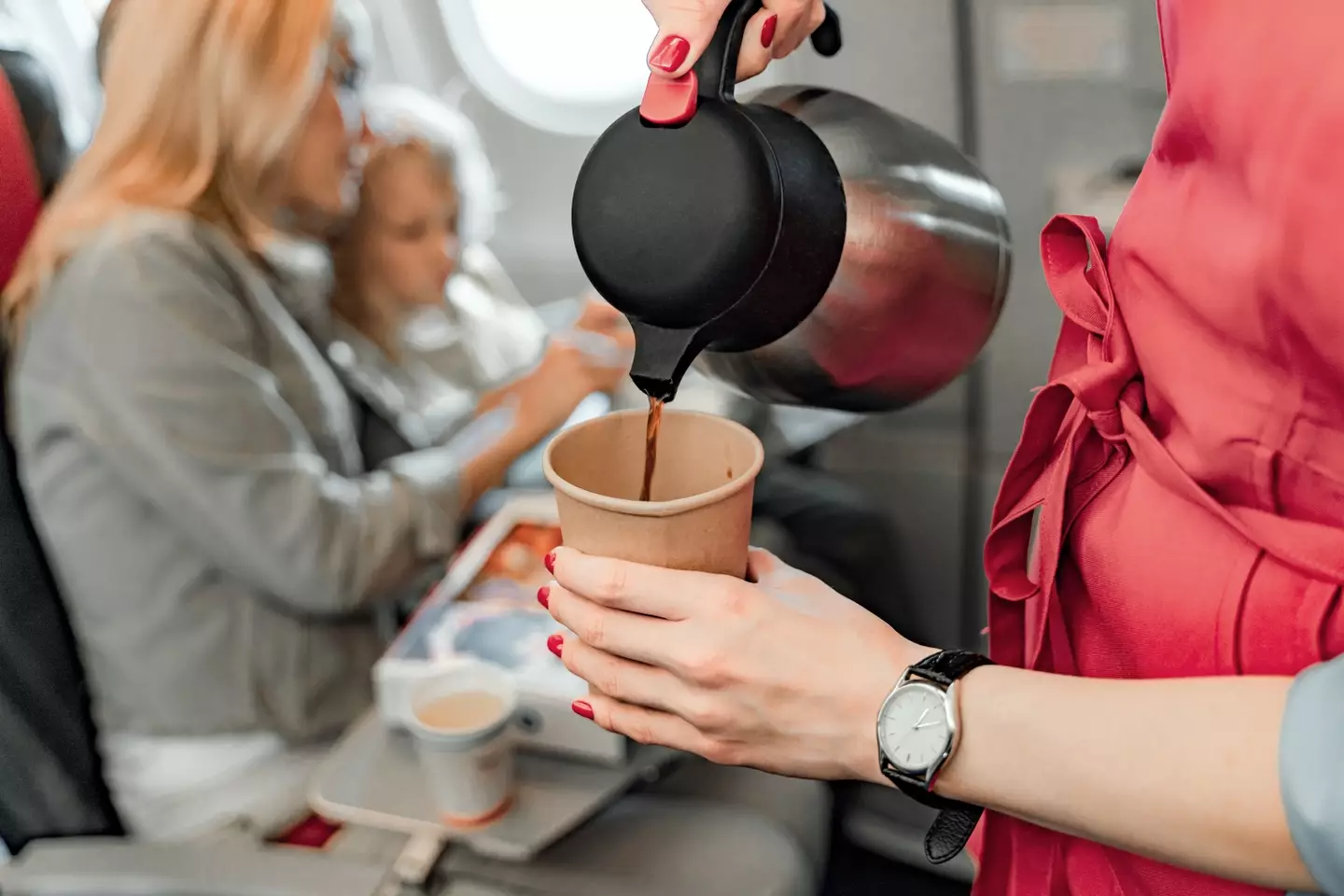Many passengers naturally order a coffee during their morning flight. (YakobchukOlena/Getty)