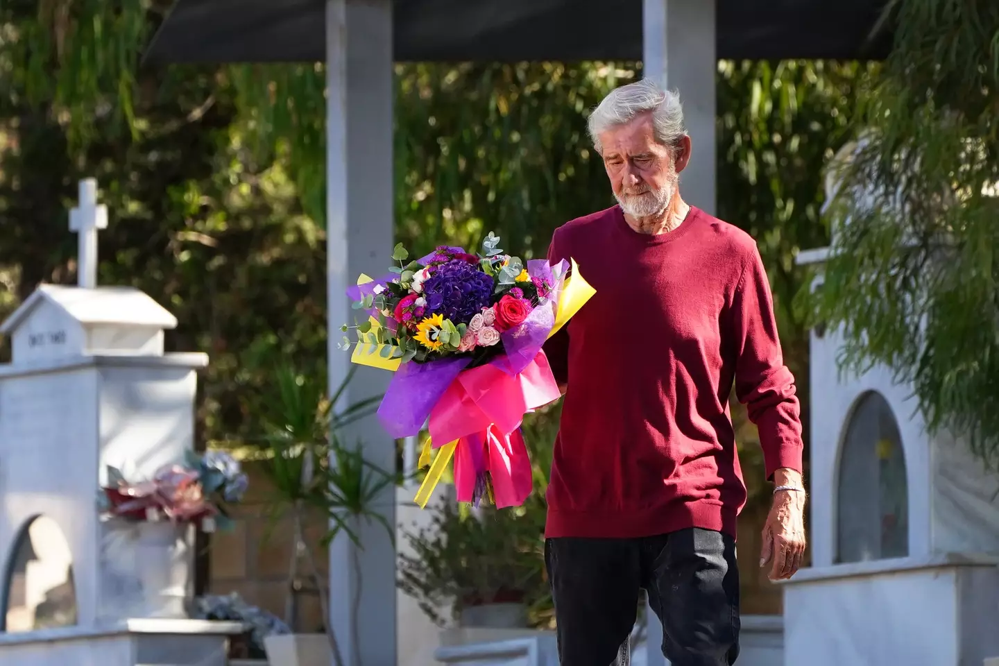 David Hunter laid flowers at the grave of his wife at a cemetery in Paphos, Cyprus.