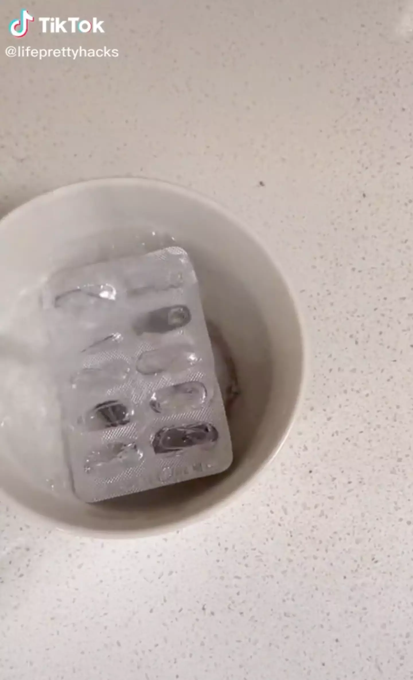 A small bowl with hot water is the starting point for this jewellery cleaning hack. (