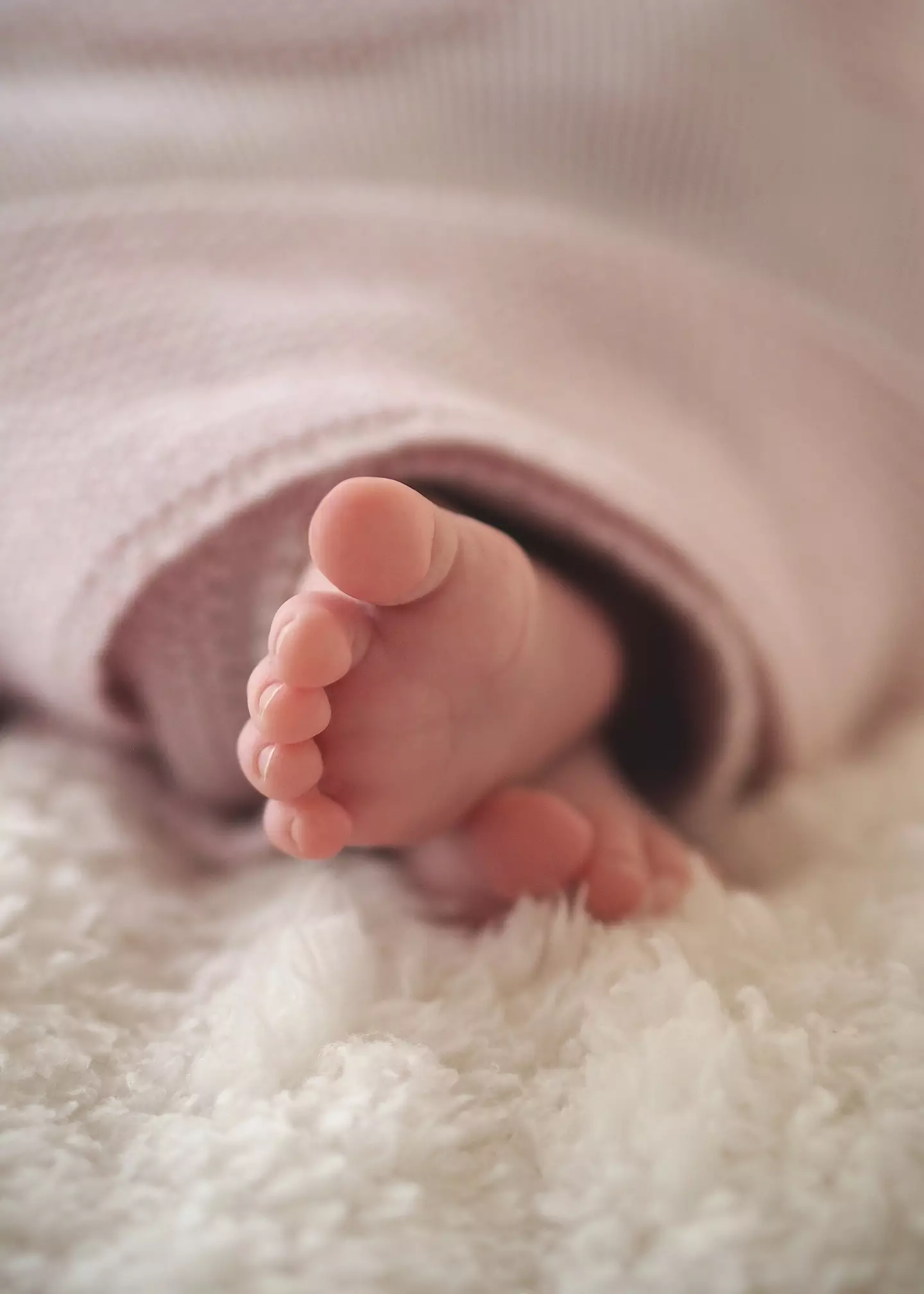 The distraught mum found her baby unresponsive on the floor of her bedroom.