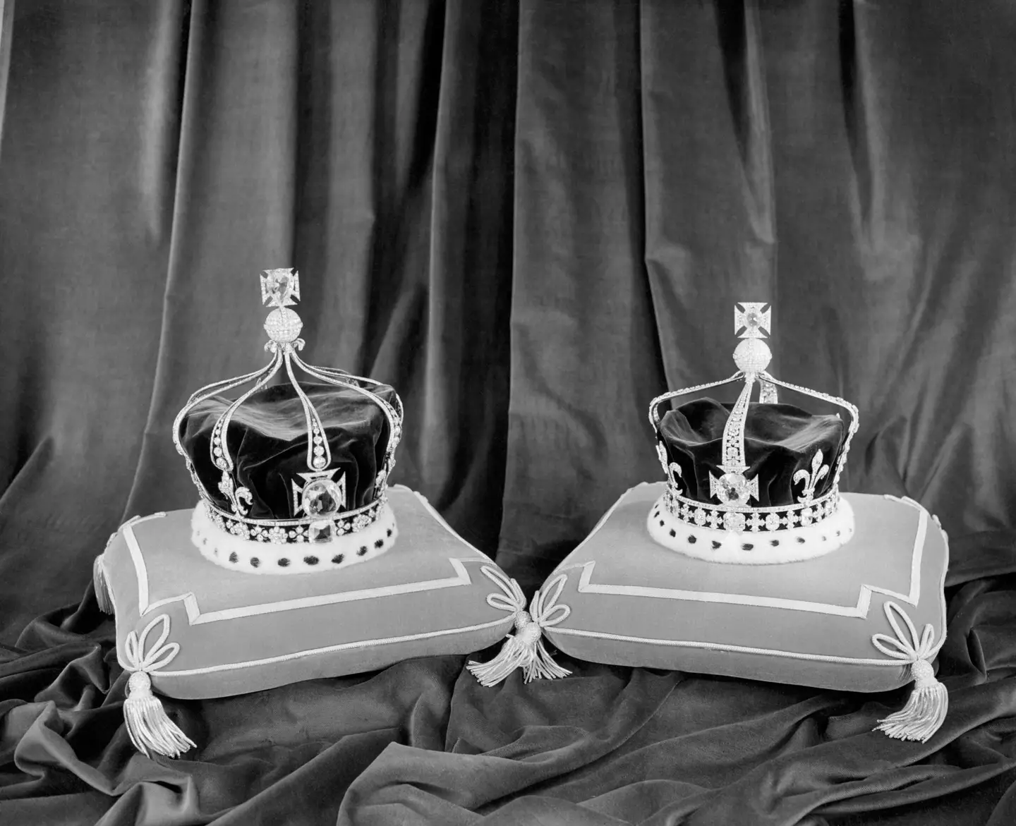 Queen Mary's Crown (left) which Camilla will wear and Queen Elizabeth the Queen Mother's Crown both had a controversial diamond.