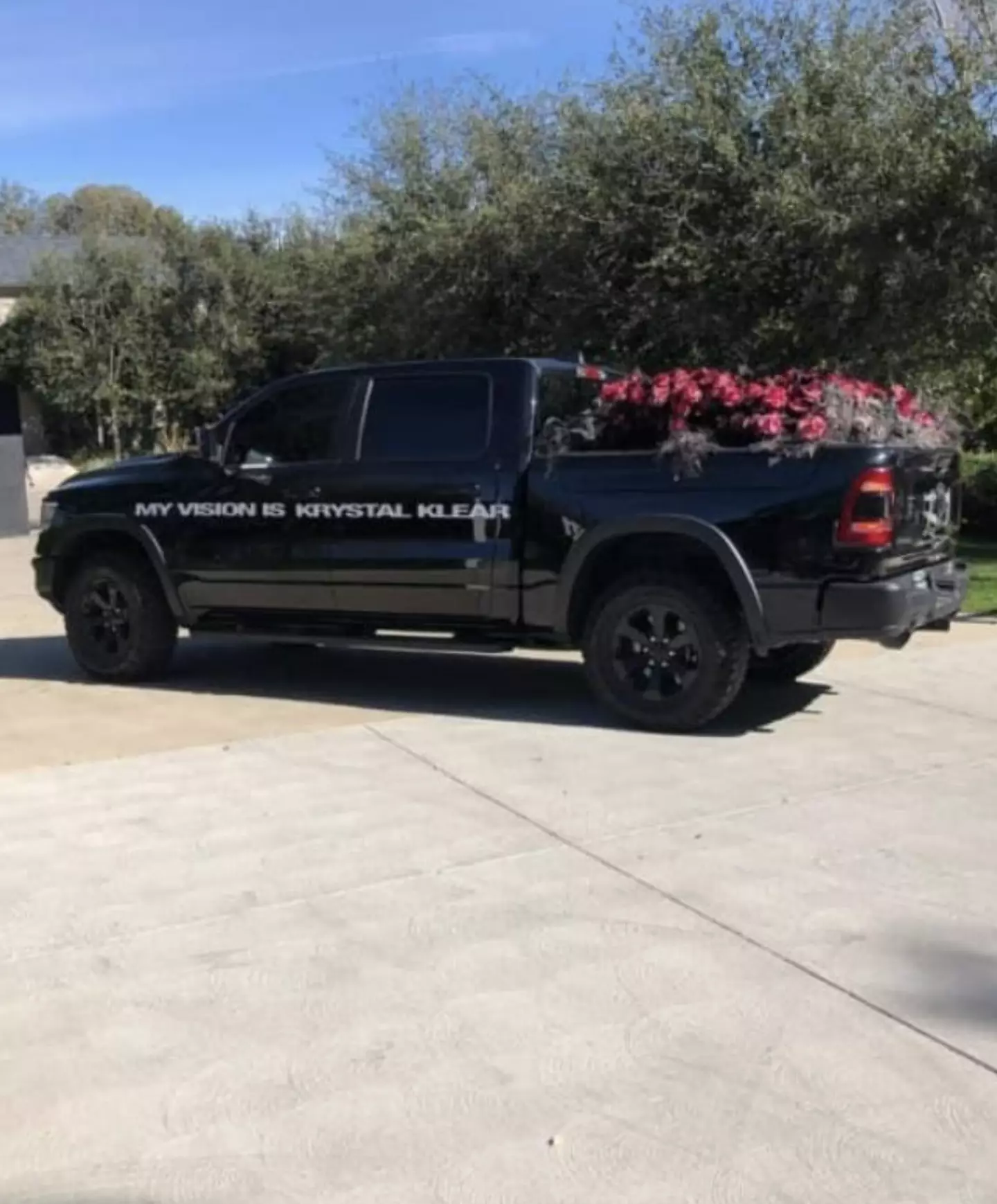 Kanye sent a truckload of roses to ex-wife Kim's house for Valentine's Day (