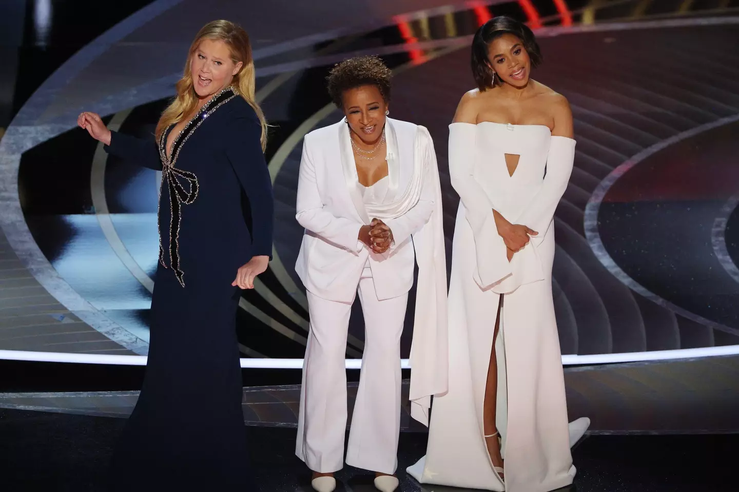 Amy Schumer onstage with co-hosts Regina Hall and Wanda Sykes (