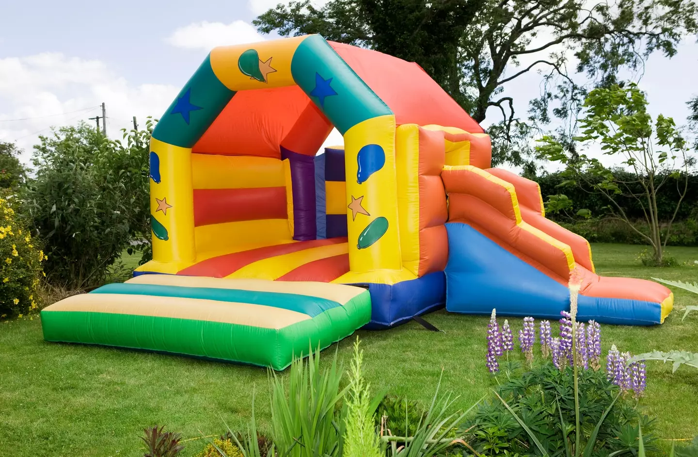 Several children were playing on a bouncy castle when the wind blew it off the ground. (MediaProduction/Getty Stock Image)