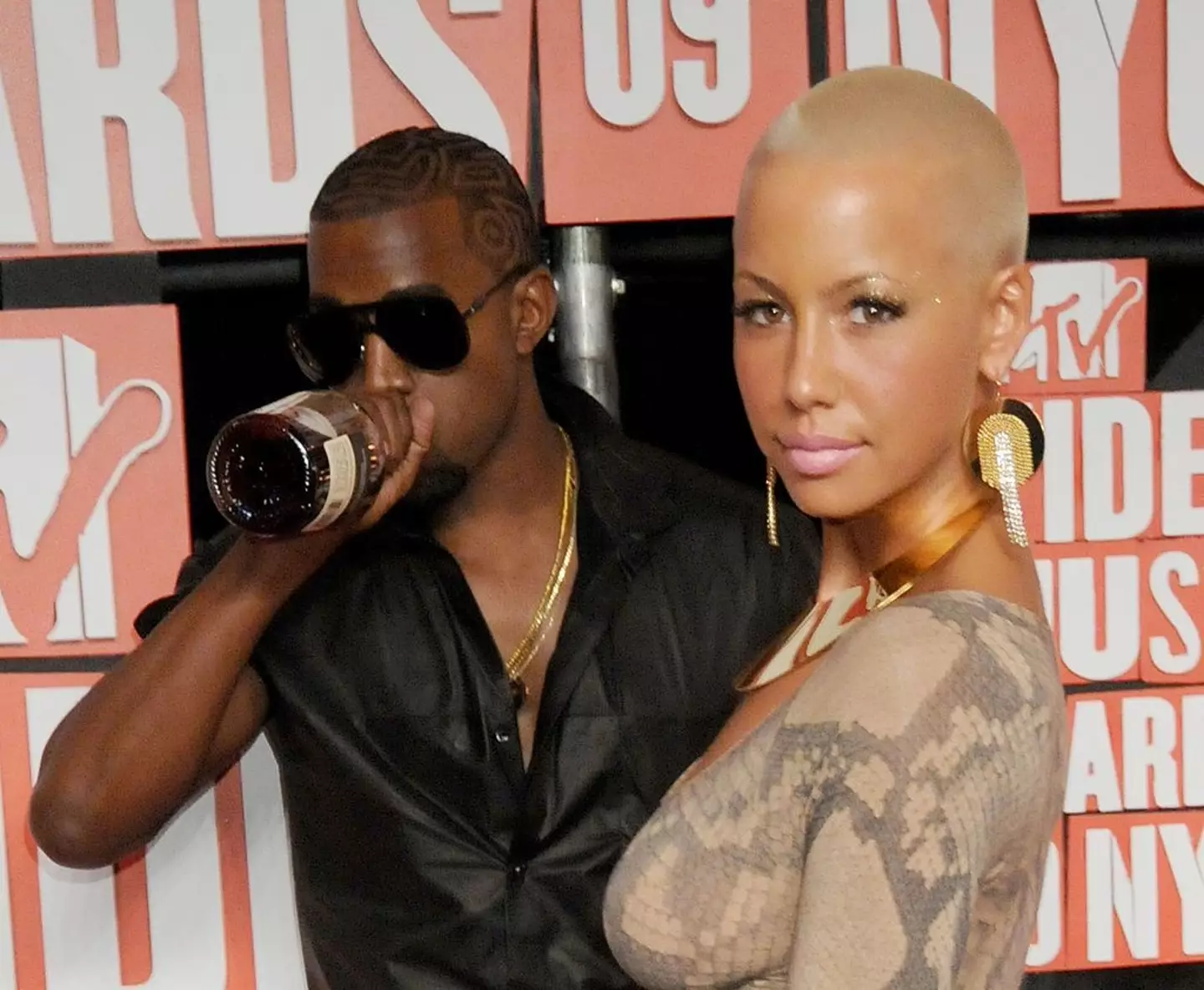 Kanye could be seen drinking the Hennessy (Gregg DeGuire/FilmMagic)