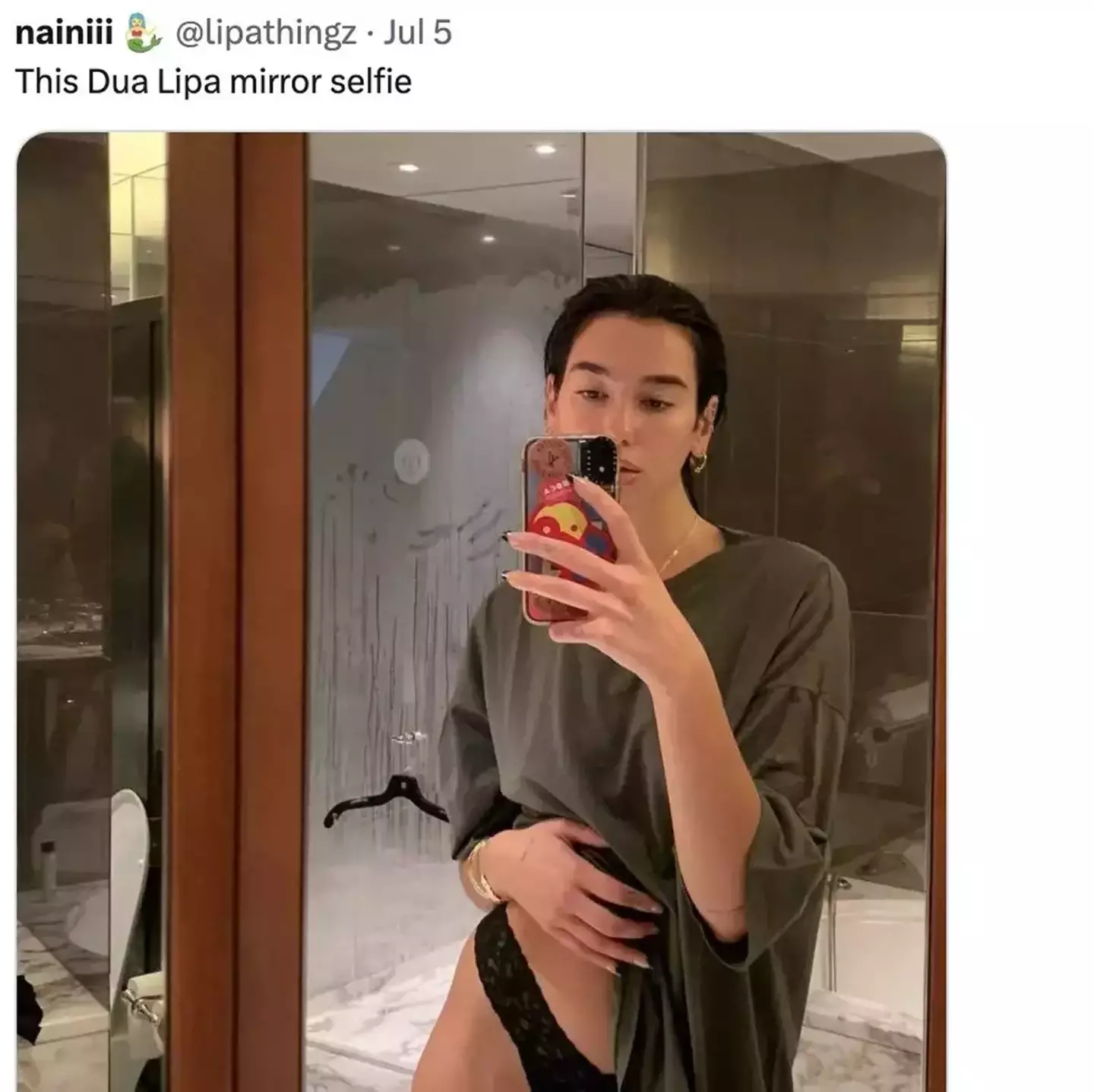 Fans couldn't stop commenting about the 'NSFW detail' in the star's selfie. (Instagram/@dualipa / X/@lipathingz)