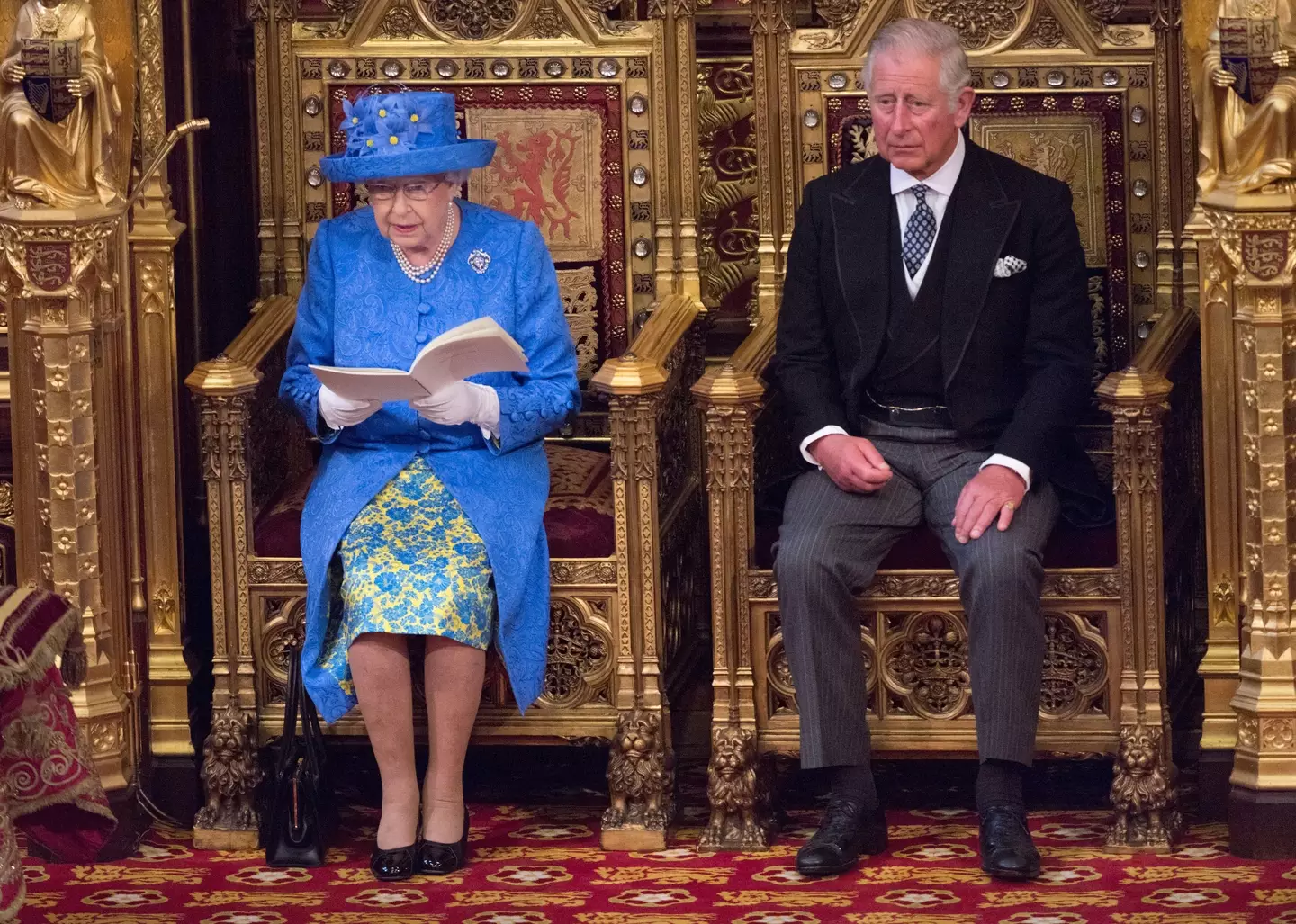 The Queen at the Palace of Westminster in London in 2017 with the now King Charles III.