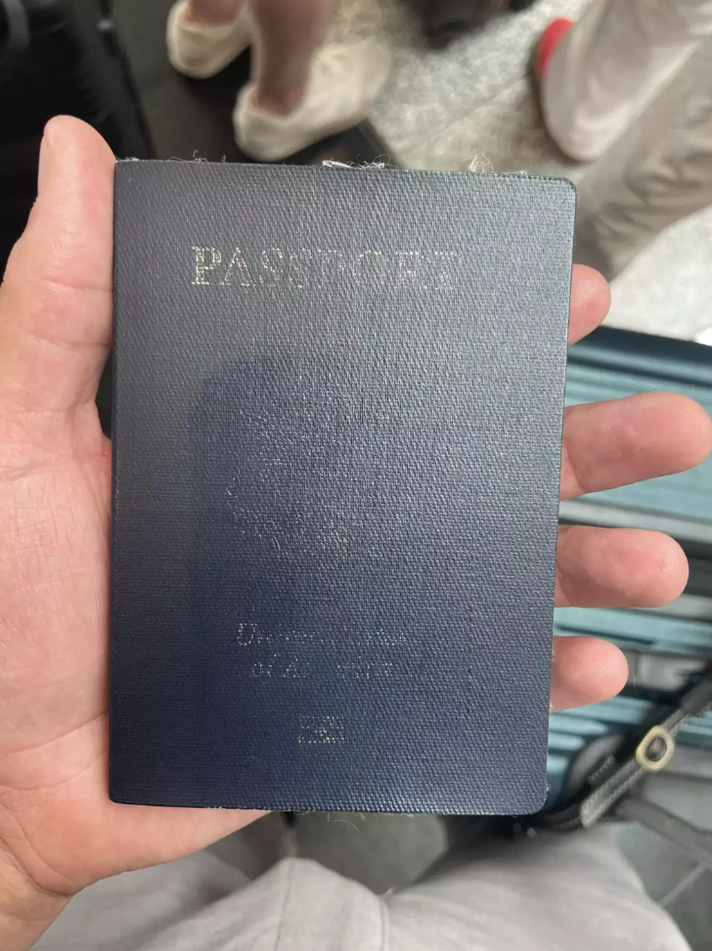 The entire front cover of the man's passport seemingly disappeared. (Reddit/@r/mildlyinfuriating)