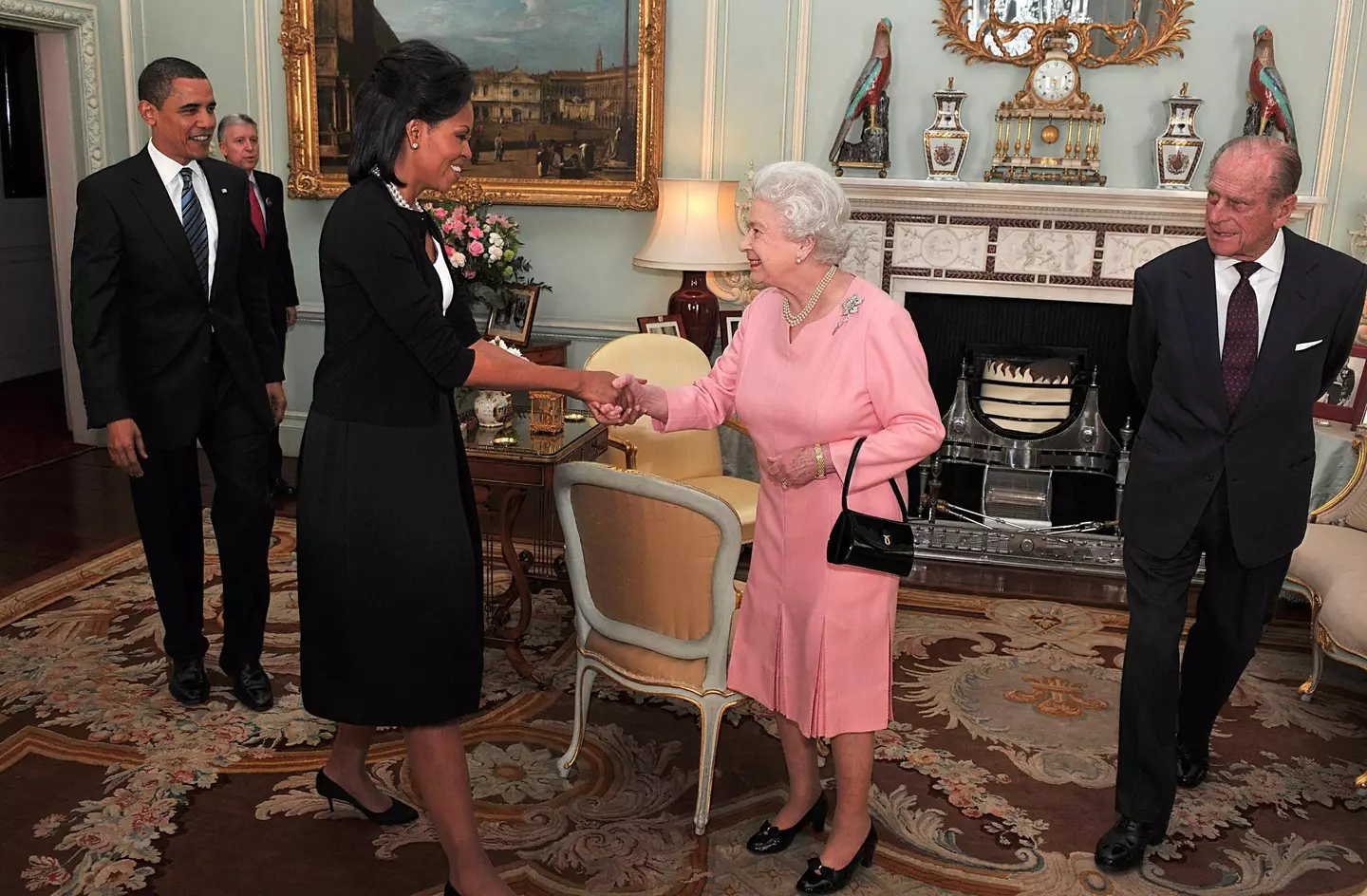 Michelle Obama has met the Queen multiple times. (John Stillwell/AFP via Getty Images)