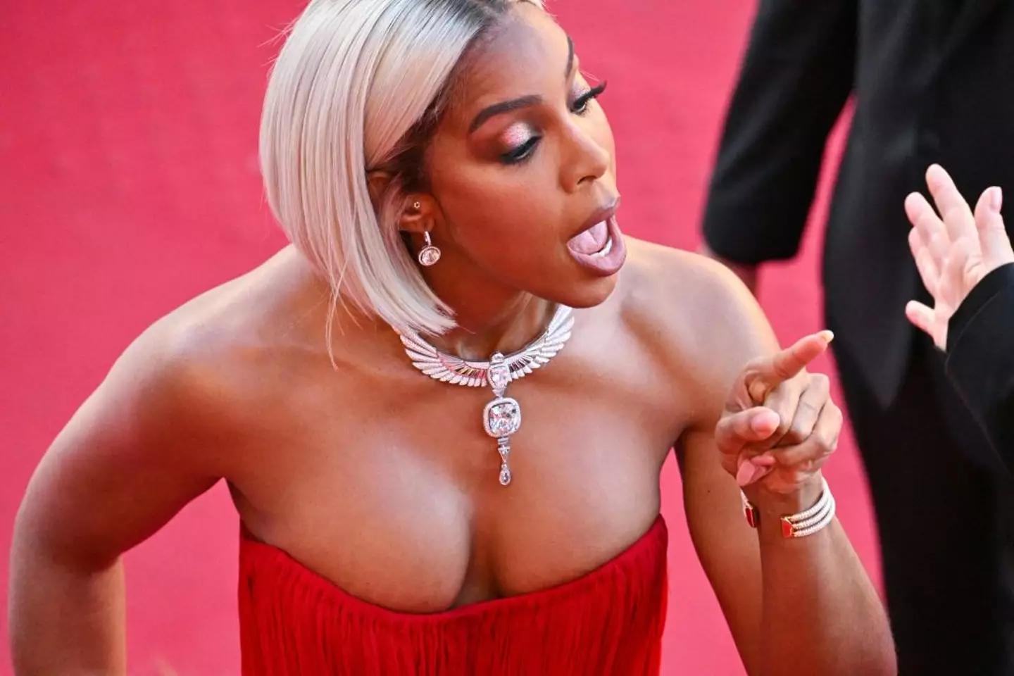 The 'Dilemma' singer appeared to get into a heated exchange with a security guard on the red carpet. (ANTONIN THUILLIER / Contributor / Getty Images)
