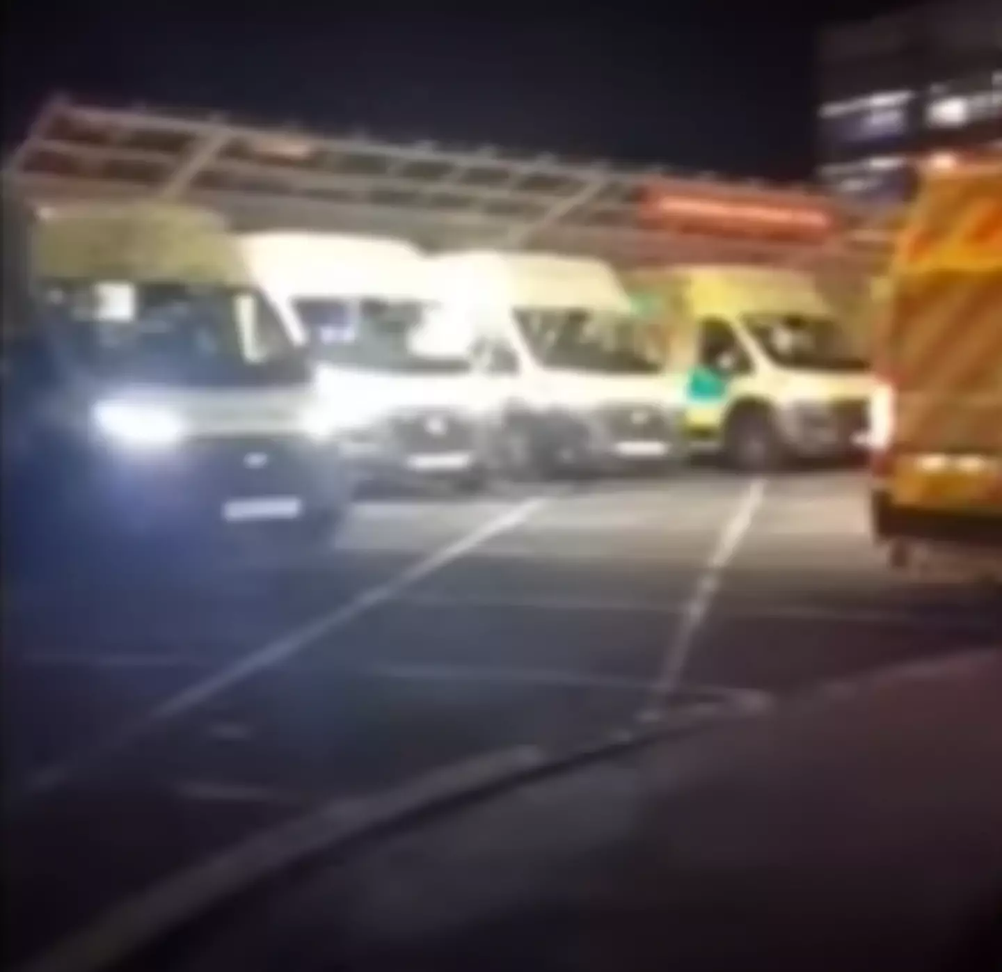 Multiple ambulances were filmed waiting outside the hospital.