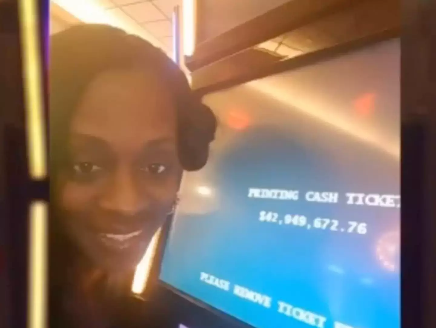 Katrina took a selfie by the machine when the eight-figure sum came up. (ABC7)