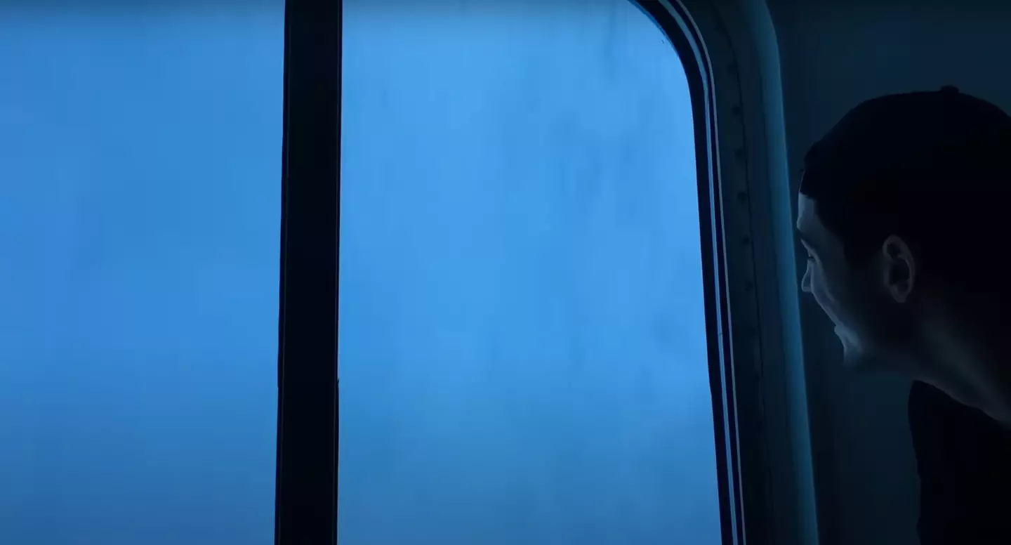 At one point the waves and sea cover the cruise ship window completely. (YouTube/Stephen J Burke)