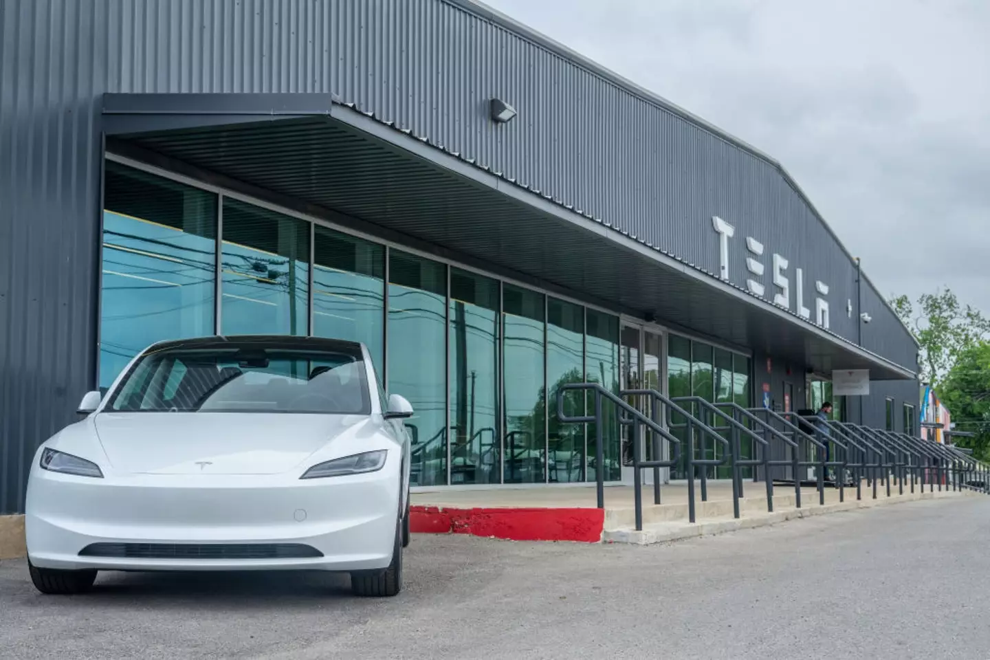A woman has claimed that driving her Tesla left her unwell (Brandon Bell/Getty Images)