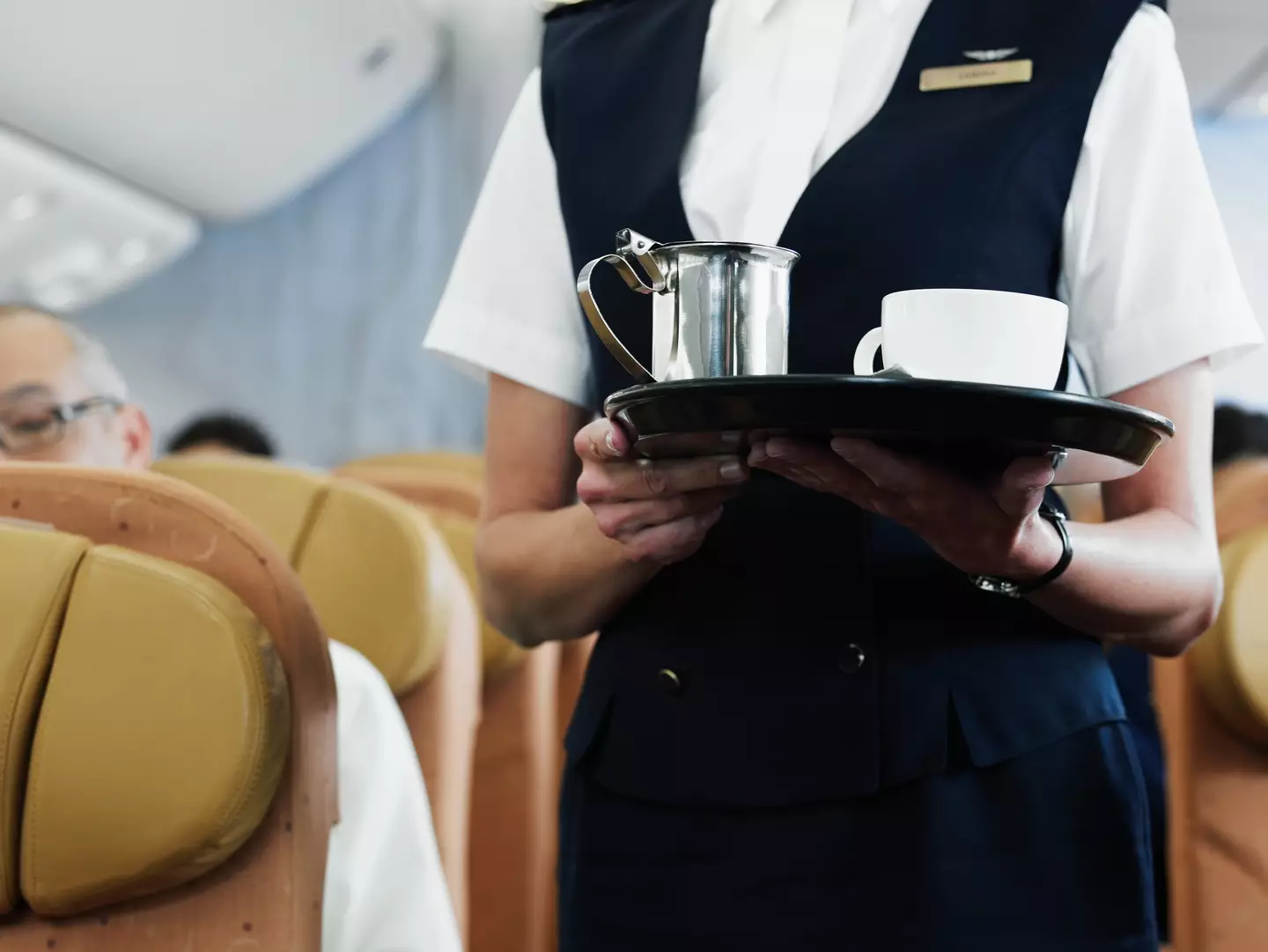 Flight attendants are rarely spotted drinking hot drinks. (Getty Stock Photo)