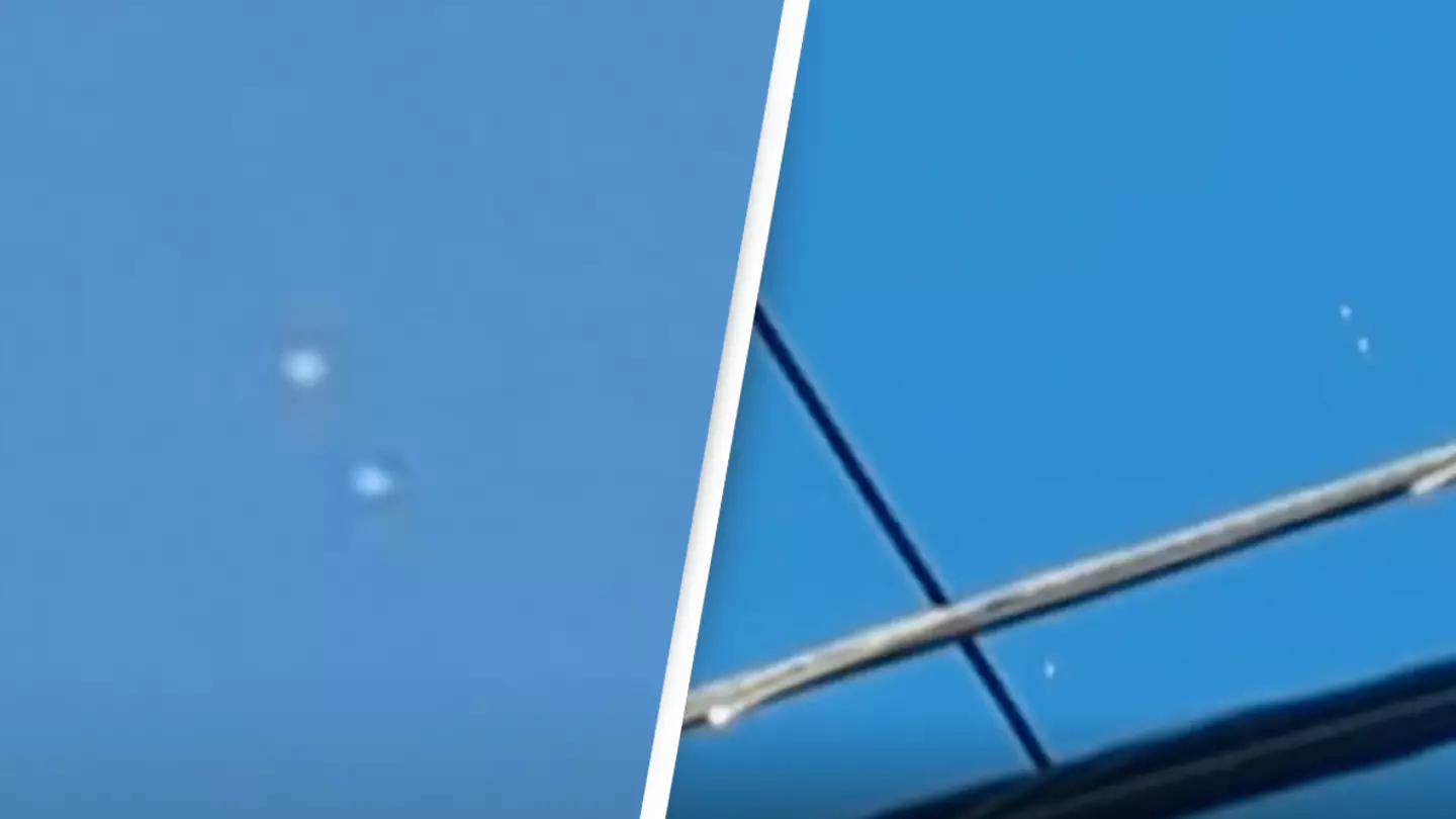 Bizarre footage captures cluster of UFOs in the sky ‘darting back and forth’