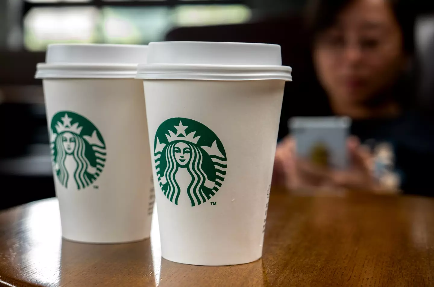 You can get free things with the Starbucks rewards program. (Zhang Peng/LightRocket via Getty Images)
