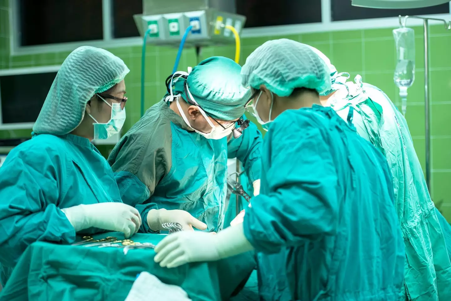 The four hour surgery saw a heart and kidney from a HIV-positive donor given to an unnamed 60 year old woman.
