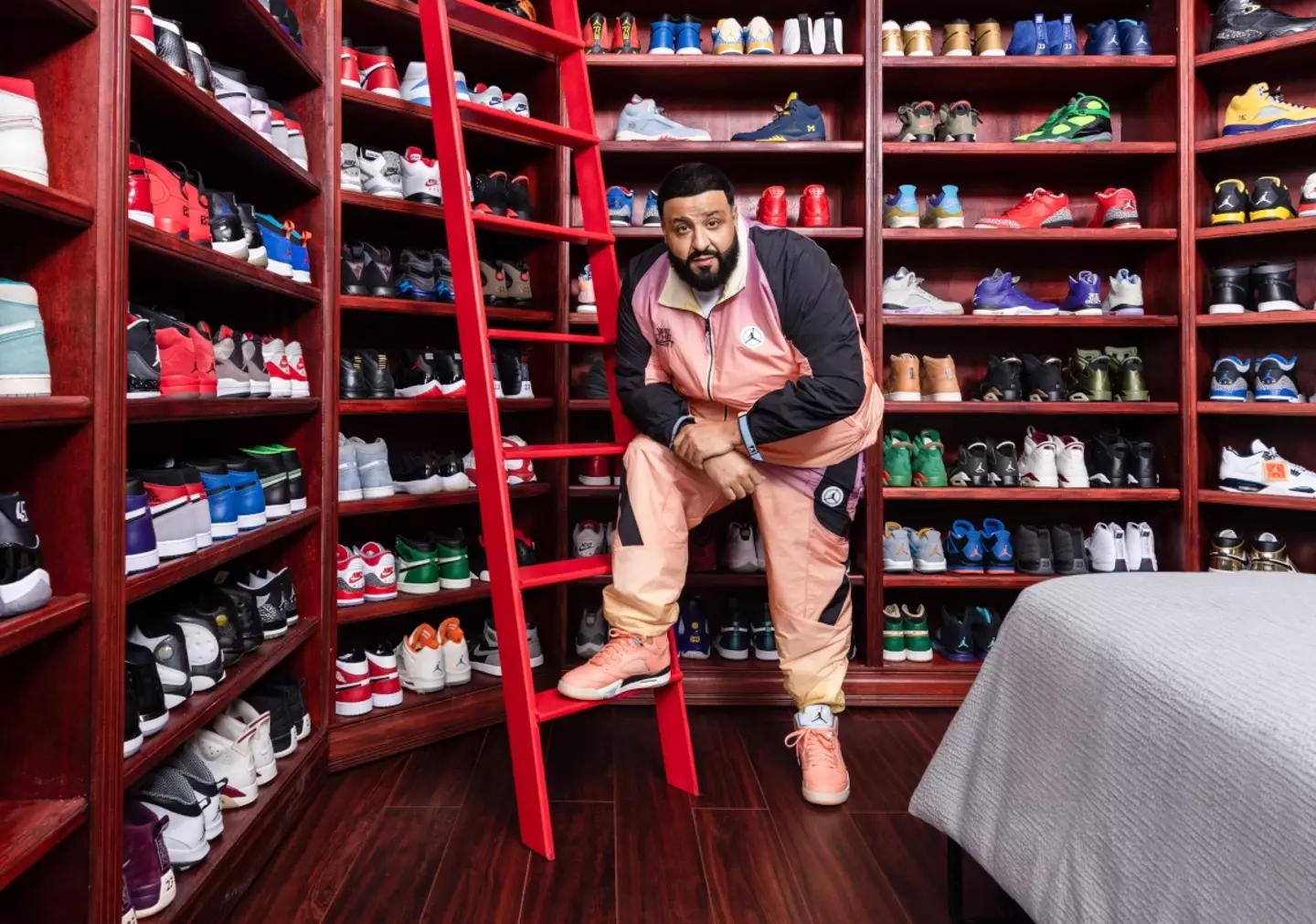 Shoes from DJ Khaled's personal collection line the walls.