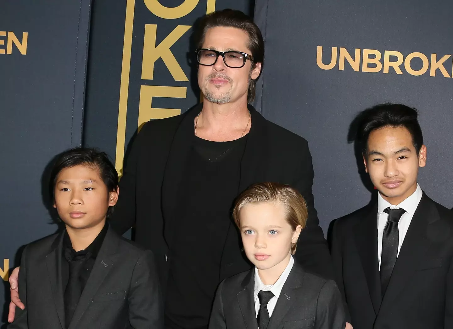 Brad Pitt pictured with his kids Pax, Shiloh and Maddox in 2014. (JB Lacroix/WireImage)